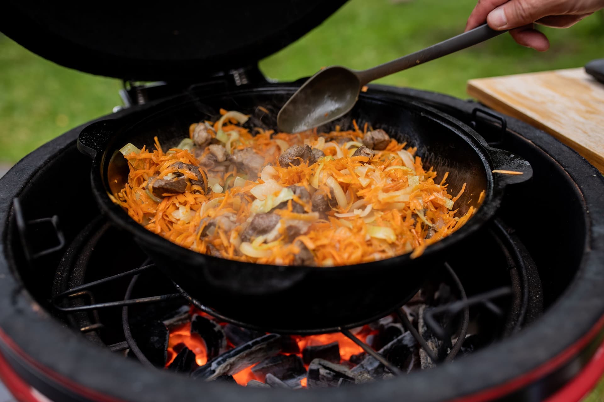 A ceramic-style kamado charcoal grill